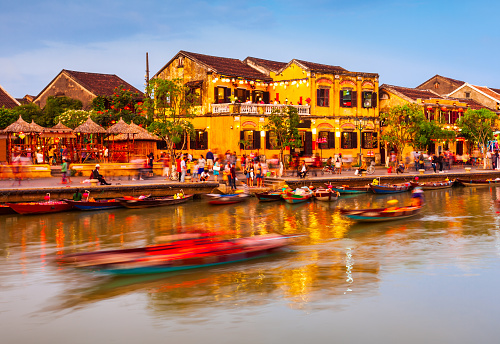 Fishing boats at the riverfront of Hoi An ancient town in Quang Nam Province of Vietnam