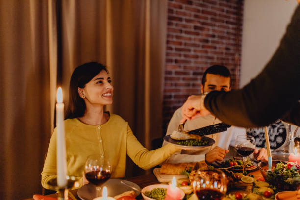 istock New year dinner at home with friends 1353097767