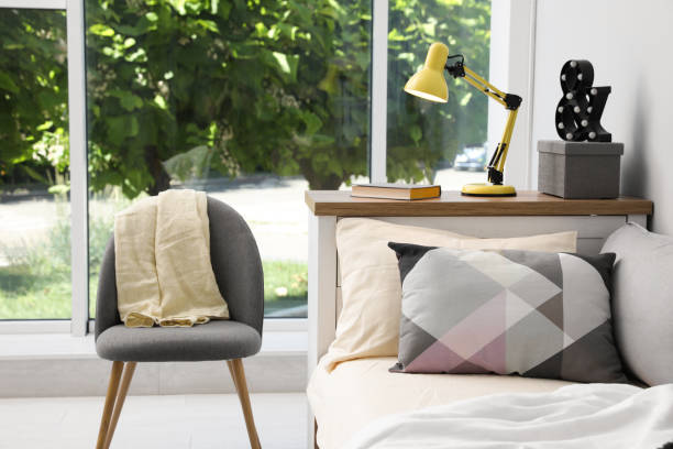 istock Modern teenager's room interior with comfortable bed and stylish design elements 1353098865