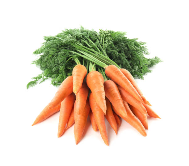 istock Bunch of fresh ripe carrots isolated on white 1353099421