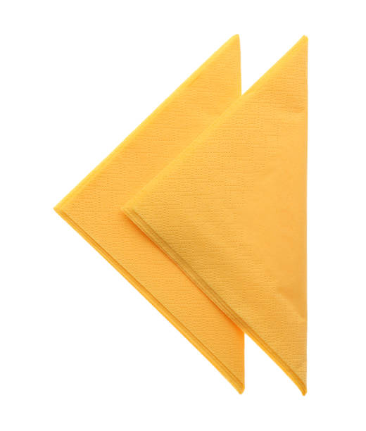 istock Folded yellow clean paper tissues on white background, top view 1353099648