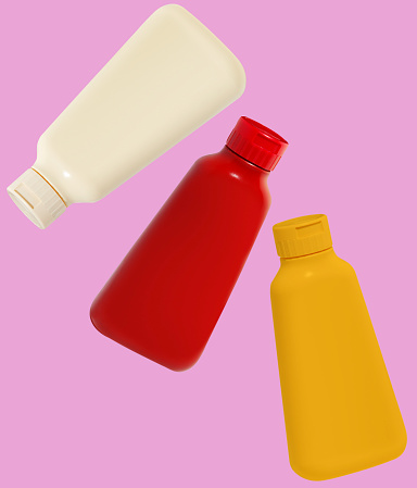 Ketchup and mustard bottles with clipping path on white background
