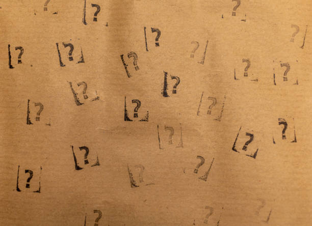 istock craft paper with many stamped questions marks 1353106774