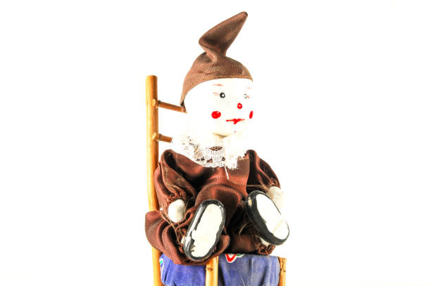 istock Pierrot toy doll on white background 1353110619