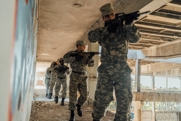 istock Soldiers in action 1353111763
