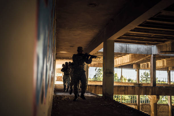 istock Soldiers in action 1353111845