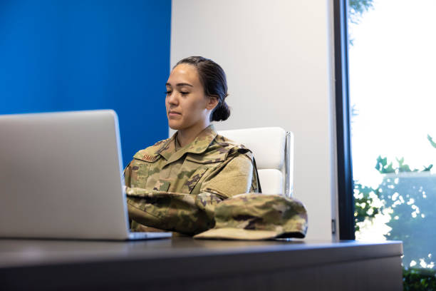 istock Air Force Military member in an office 1353111900