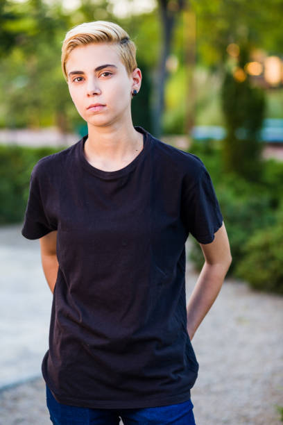 Tomboy androgynous lesbian non binary beauty in casual clothes gender lgtbi sex education. Sexual identity lesbian, homosexuality stock photo