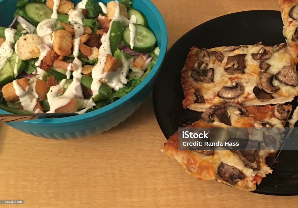 Square Pizza and Salad Mushroom Pizza and Salad with Ranch Dressing Romaine Lettuce Stock Photo