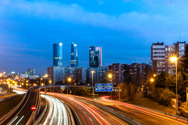 istock Night lights in a bustling city 1353117834