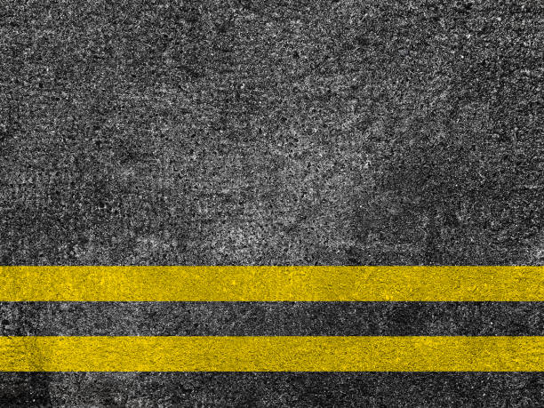 istock Asphalt road with double yellow lines 1353118754