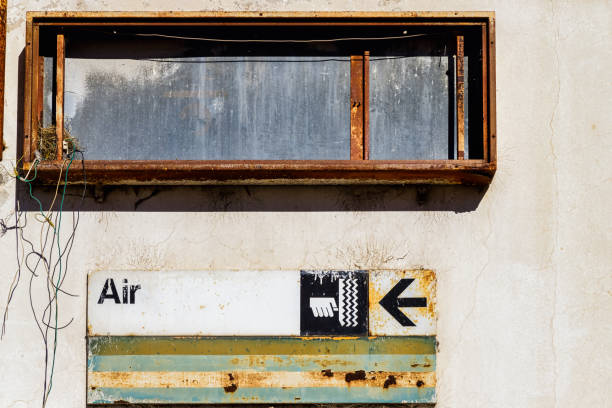istock Air pump sign at abandoned gas station 1353128023