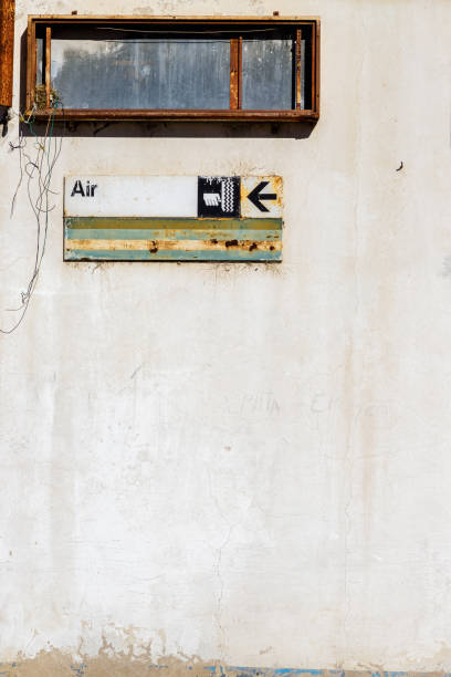 air pump sign at abandoned gas station - station retro revival gas station old imagens e fotografias de stock