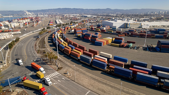 High quality stock photos of container shipping being picked up by semi-trucks at the Port of Oakland