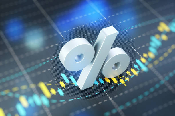 istock Percentage Sign on A Blue Financial Graph 1353134056