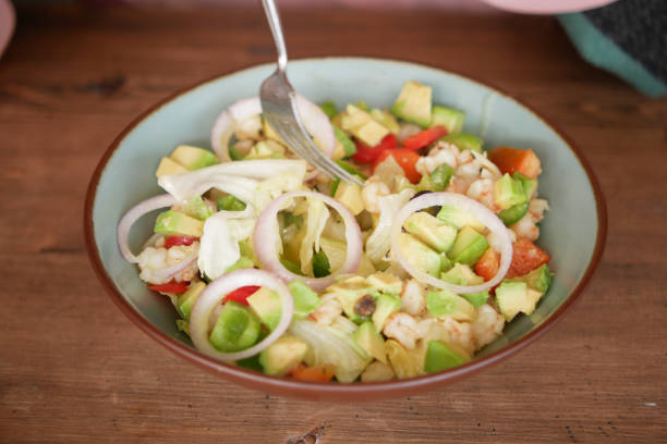 istock top view of avocado salad in a bowl on table 1353140101