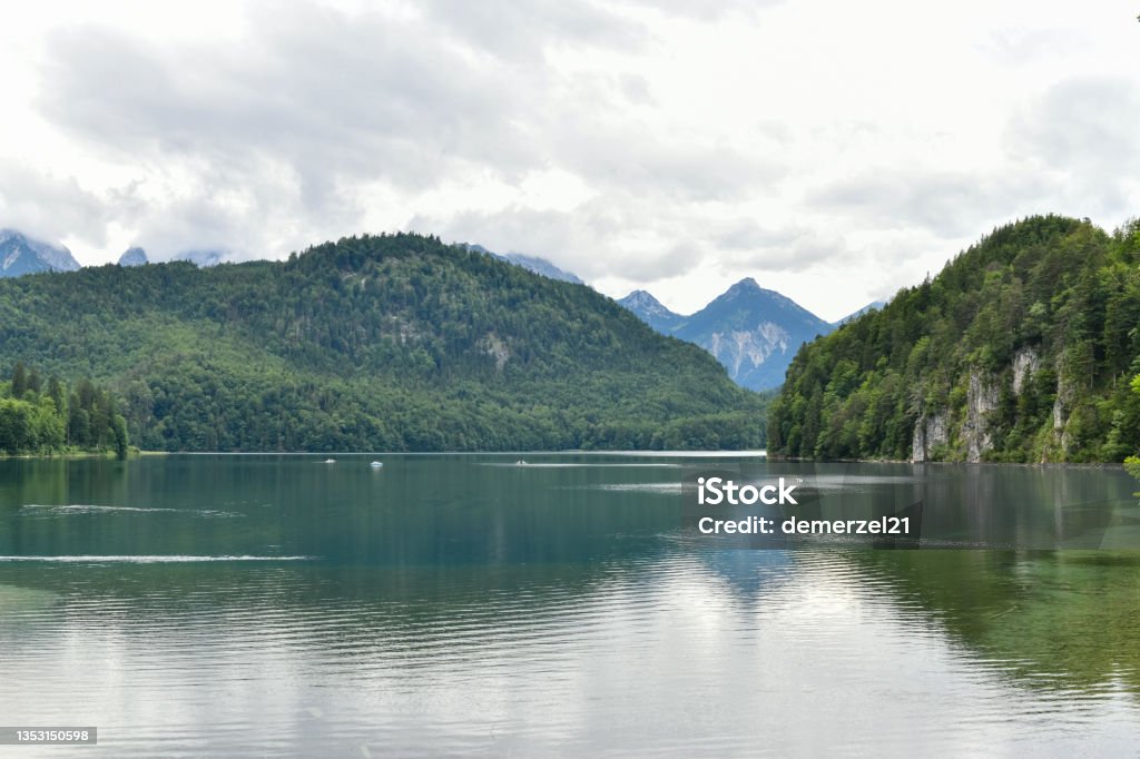 Alpsee Lake - Germany Reflection of Alpsee Lake view during Summer in Bavaria, Germany holiday Bavaria Stock Photo