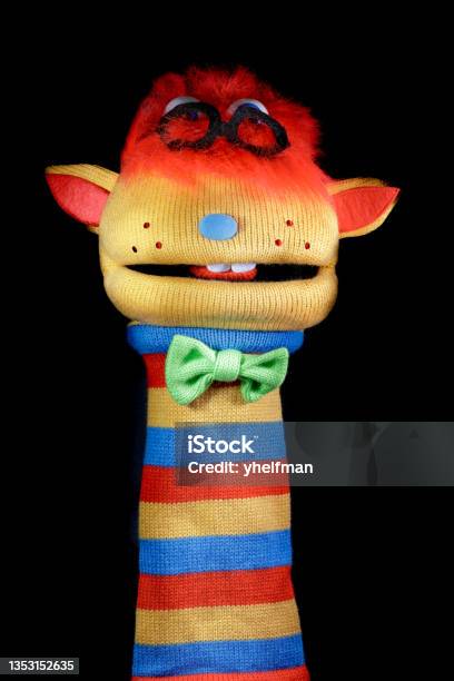 Sock Puppet Isolated Against Black Background Stock Photo - Download Image Now - Sock, Toy, Humor