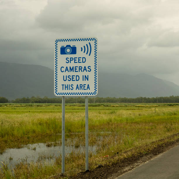 Speed Camera Signage Speed cameras used in this area road sign on a country highway speed limit sign australia stock pictures, royalty-free photos & images