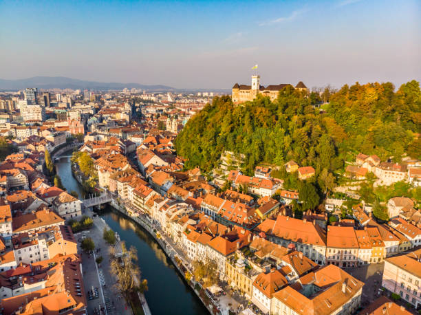 Cityscape of Ljubljana, capital of Slovenia in warm afternoon sun. Aerial panoramic view of Ljubljana, capital of Slovenia in warm afternoon sun. ljubljana castle stock pictures, royalty-free photos & images