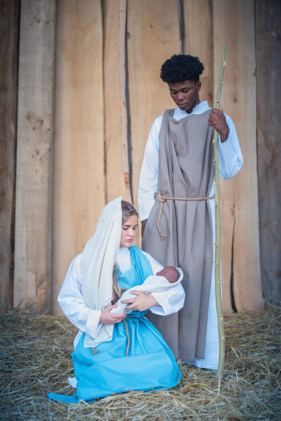 istock Caucasian virgin mary next to a black Joseph 1353156371