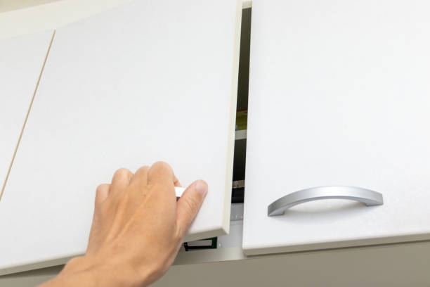 istock Open the cabinet door in the high position 1353161494