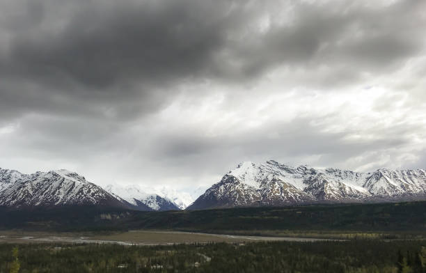 The skies above the Chugach Mountains are dark and ominous.