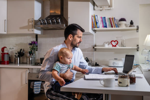 istock working at home dad and her cute toddler 1353163343