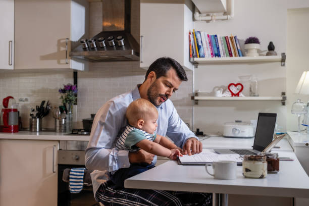 istock working at home dad and her cute toddler 1353163345
