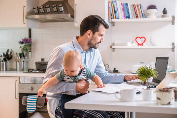 istock working at home dad and her cute toddler 1353163349