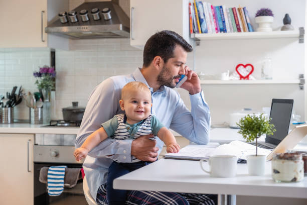 istock working at home dad and her cute toddler 1353163354