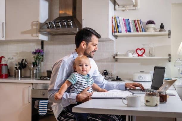 istock working at home dad and her cute toddler 1353163356