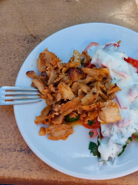 istock Doner kebab plate - chicken meat and salad 1353164267
