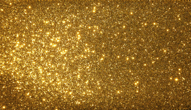 istock Golden Gold Glitter Textured Shimmer Background texture 1353166751