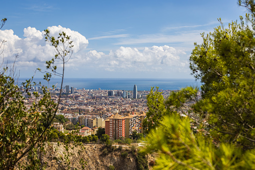 Aerial view over the skyline of Barcelona. Panoramic wide angle view from the summit of Carmel bunkers, a viewpoint from which you can see the whole city. It is located at the top of Turó de la Rovira