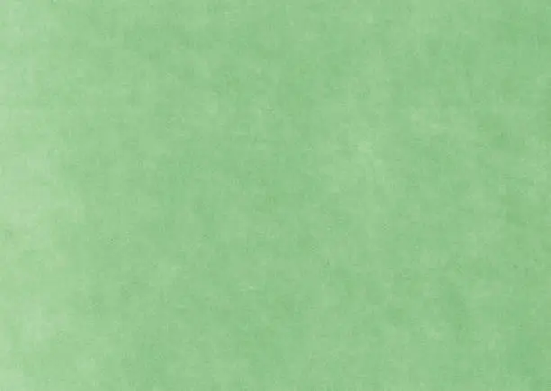 Green textured cardboard background