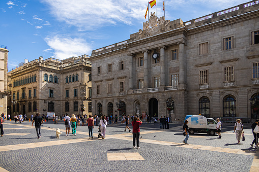 Barcelona, Spain - September 22, 2021: Plaza de Sant Jaume. Historic palace, houses the offices of the Presidency of the Generalitat de Catalunya. Located in the district of Ciutat Vella in Barcelona
