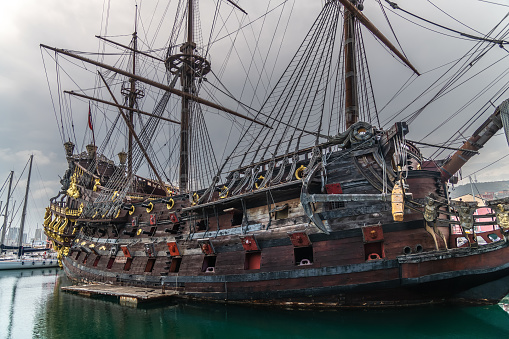Genoa, Italy - 26.07.2021 : The replica of a fully rigged Spanish galleon called Neptune in the harbour of Genoa in northern Italy