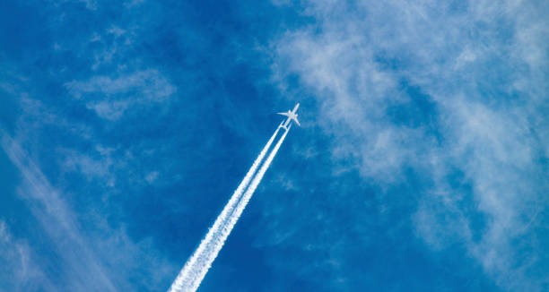 istock Airplane in the sky 1353181505