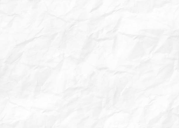 istock White crumpled paper texture background. Clean surface, wrinkled, abstract top view. Cardboard textured template for banner, poster. Abstract pattern. Raster image 1353182357