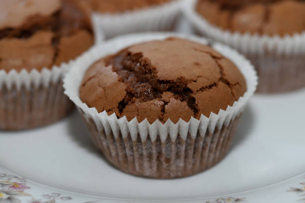 istock Tasty chocolate muffin close-up 1353182464