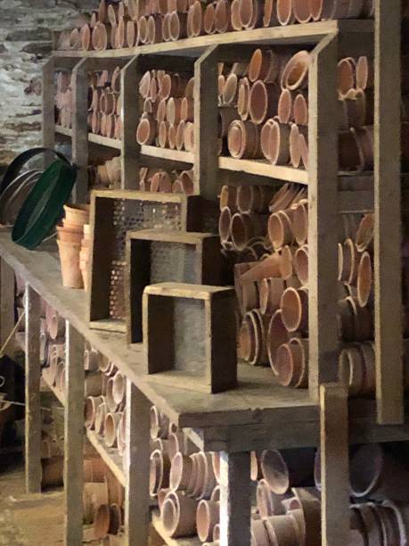 istock Wall of pots 1353182628