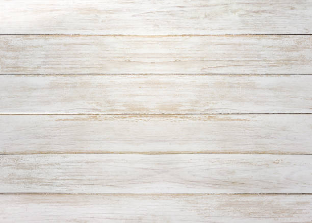 istock White gray wood color texture horizontal for background. Surface light clean of table top view. Natural patterns for design art work and interior or exterior. Grunge old white wood board wall pattern 1353183499