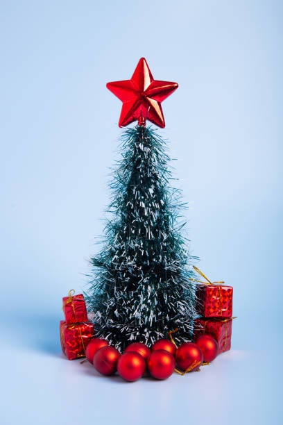 istock Christmas composition. Christmas gifts, decorations on blue background. 1353183617