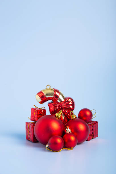 istock Christmas composition. Christmas gifts, decorations on blue background. 1353183627