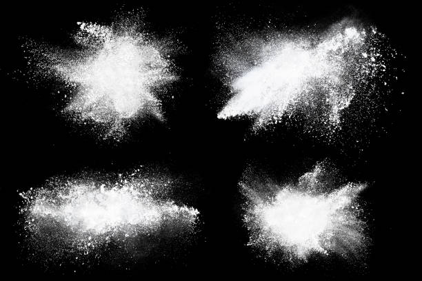 Set of dust powder clouds on black background stock photo