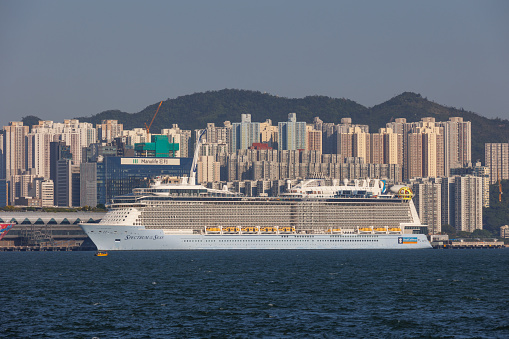 Hong Kong - November 14, 2021 : Spectrum of the Seas at the Kai Tak Cruise Terminal in Hong Kong. Spectrum of the Seas is a cruise ship currently operated by Royal Caribbean International.