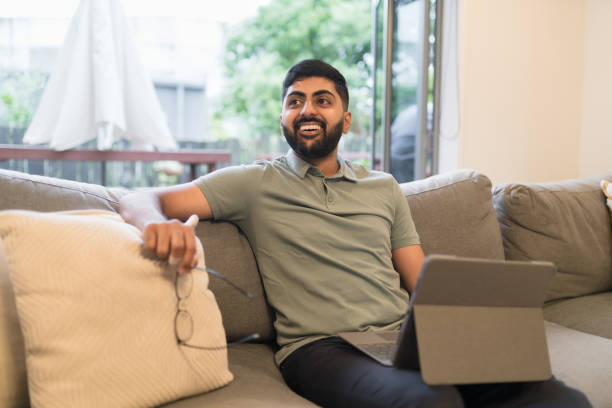 istock Happy adult man and work from home. 1353184938