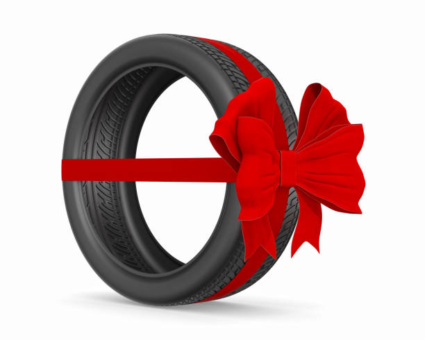 istock tire with bow on white background. Isolated 3D illustration 1353185041