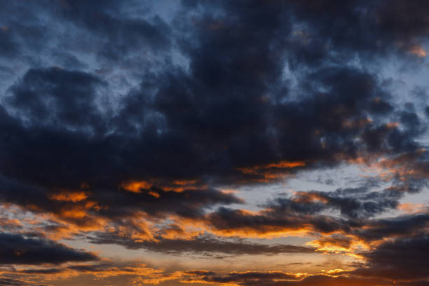 istock The sky at sunset. Clouds at sunset 1353186734